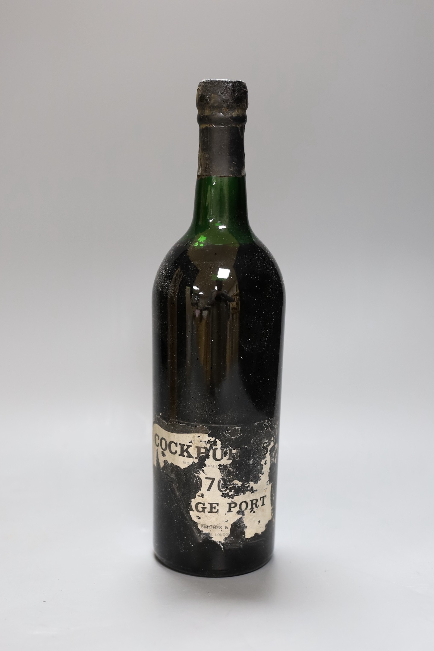 A cased bottle of Cockburns 1970 vintage port.